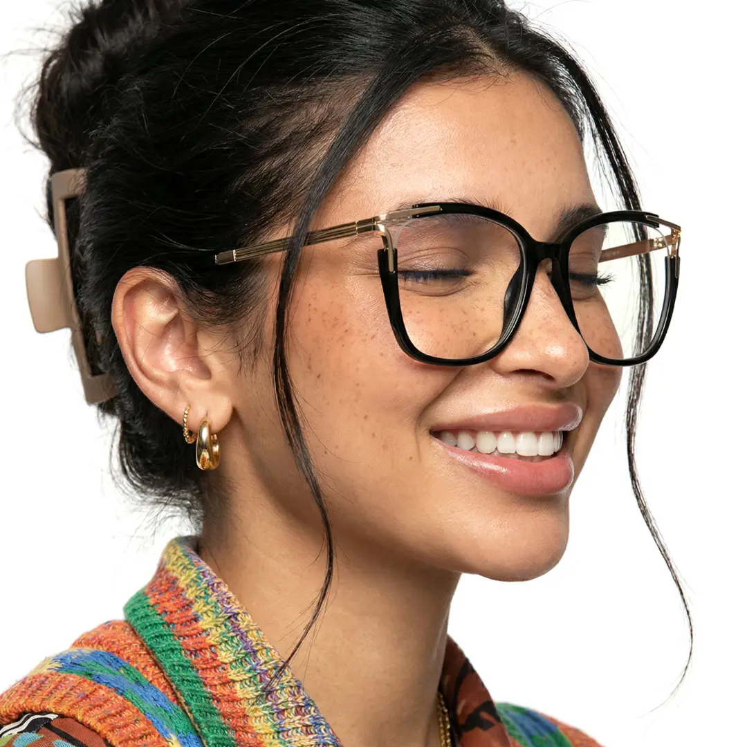 Looking away view of female wearing black square eyeglasses, smiling, SR0062501