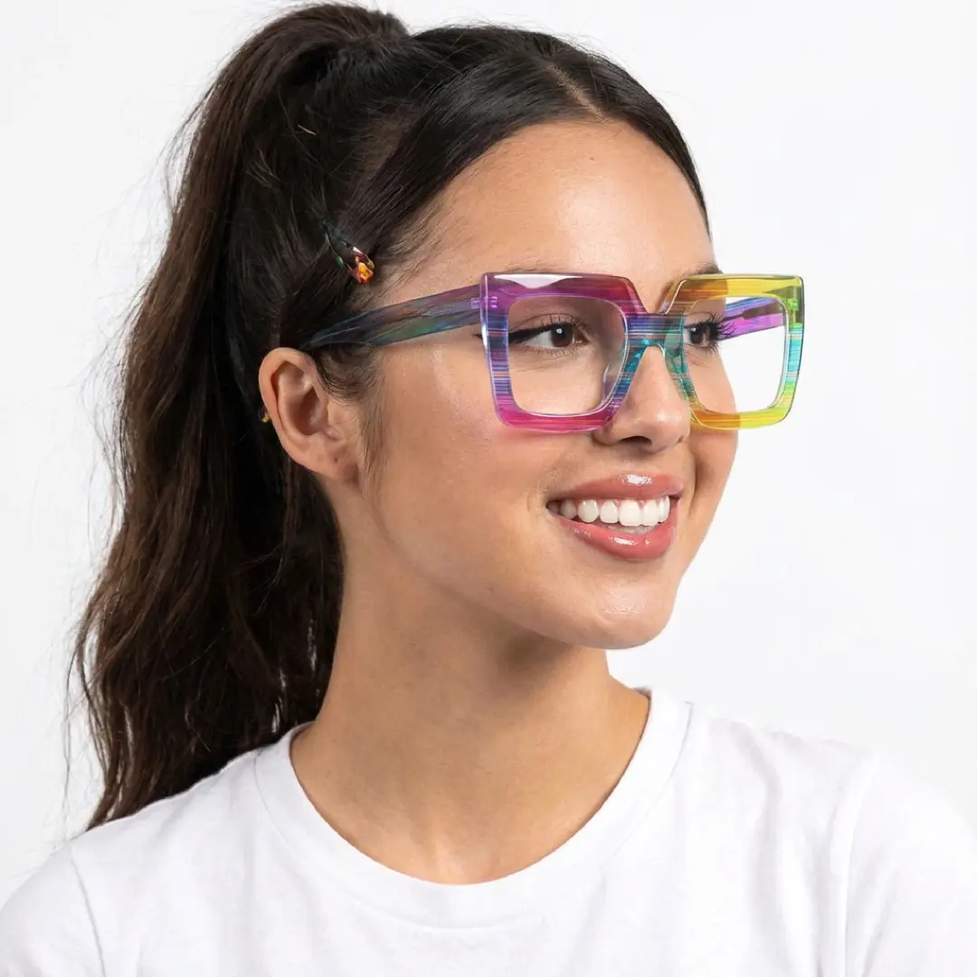 Looking away view of female wearing multicolor square eyeglasses, soft smile, SR0062509