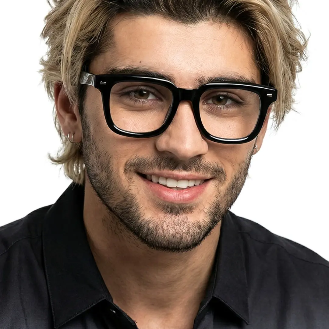 Face close-up view of male wearing black square eyeglasses, soft smile, SR0082508