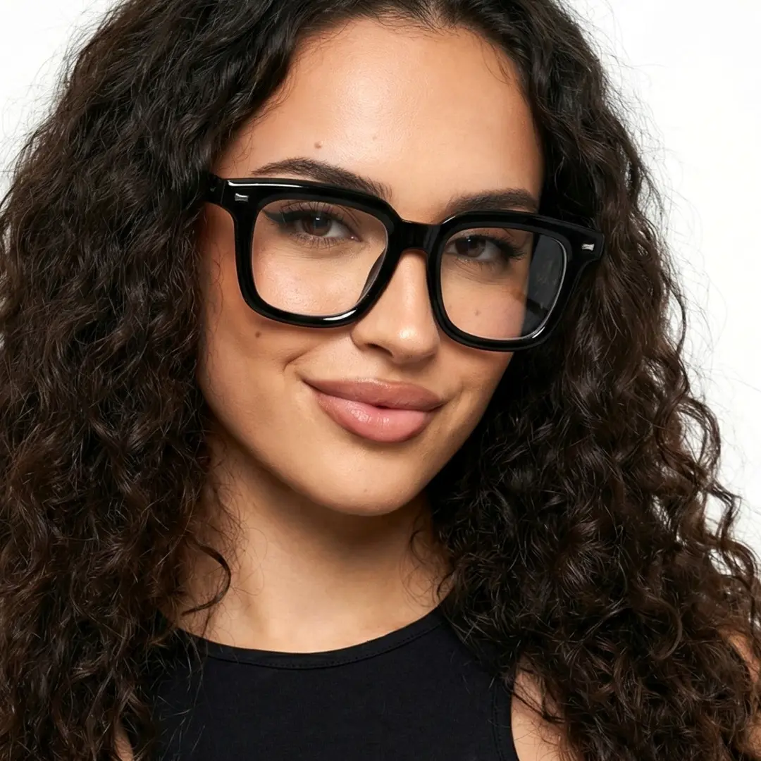 Looking straight ahead view of female wearing black square eyeglasses, neutral expression, SR0082508