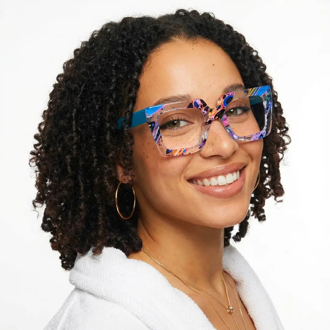 Face close-up view of female wearing multicolor square eyeglasses, smiling, SR0082509