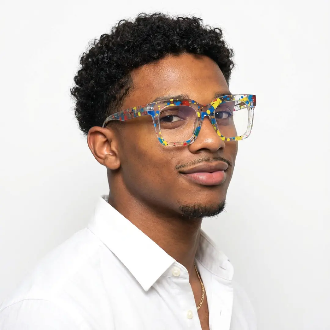 Over-the-shoulder view of male wearing multicolor square eyeglasses, friendly smile, SR0112509