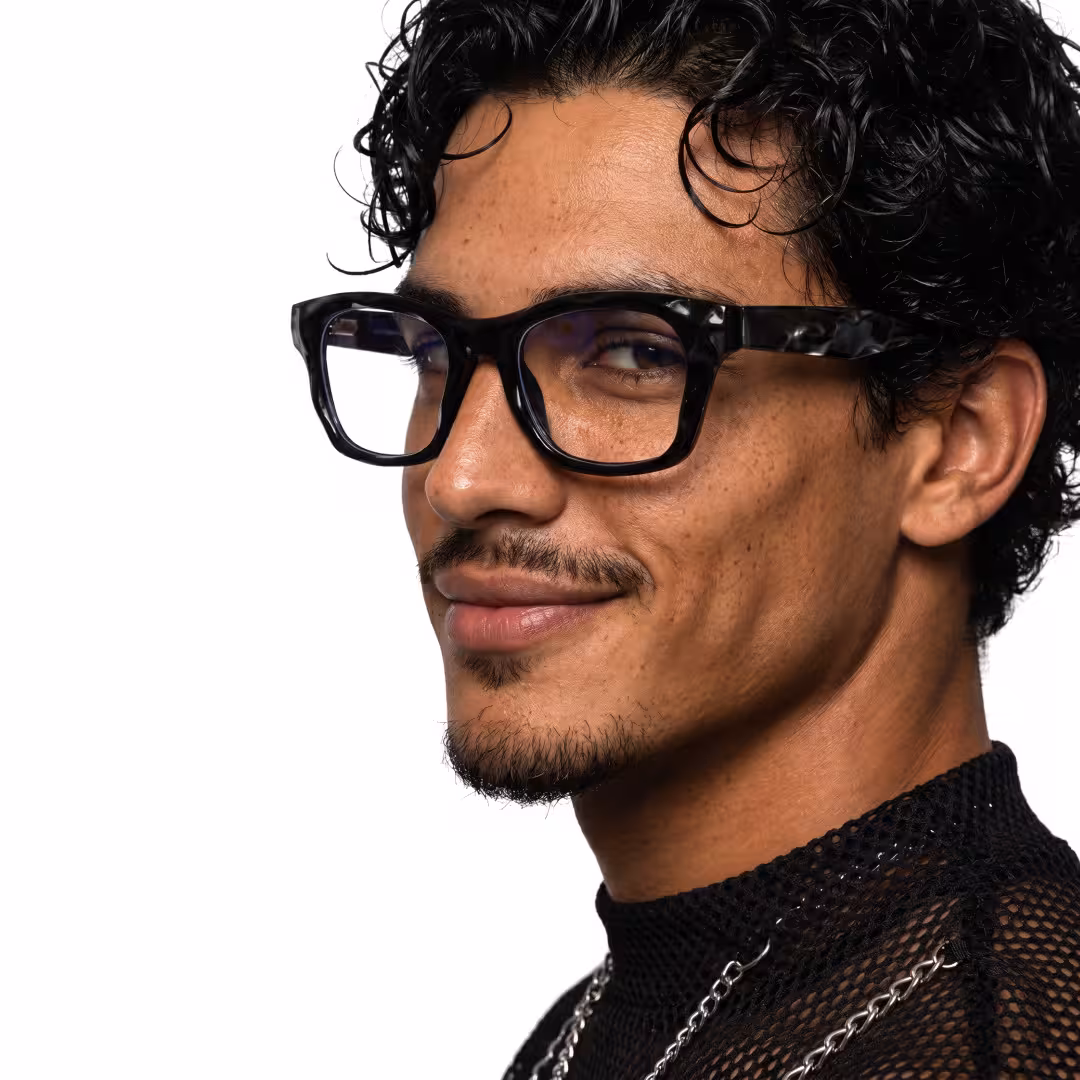 Male wearing black square tr90 eyeglasses, natural smile. SPU: SR0122605