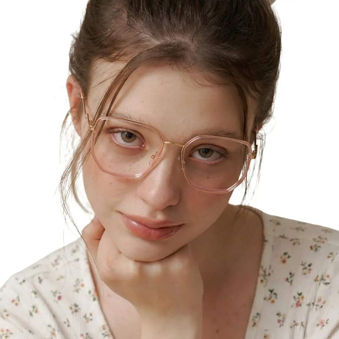 Face close-up view of female wearing pink square eyeglasses, resting chin on hand, neutral expression, SR0132209