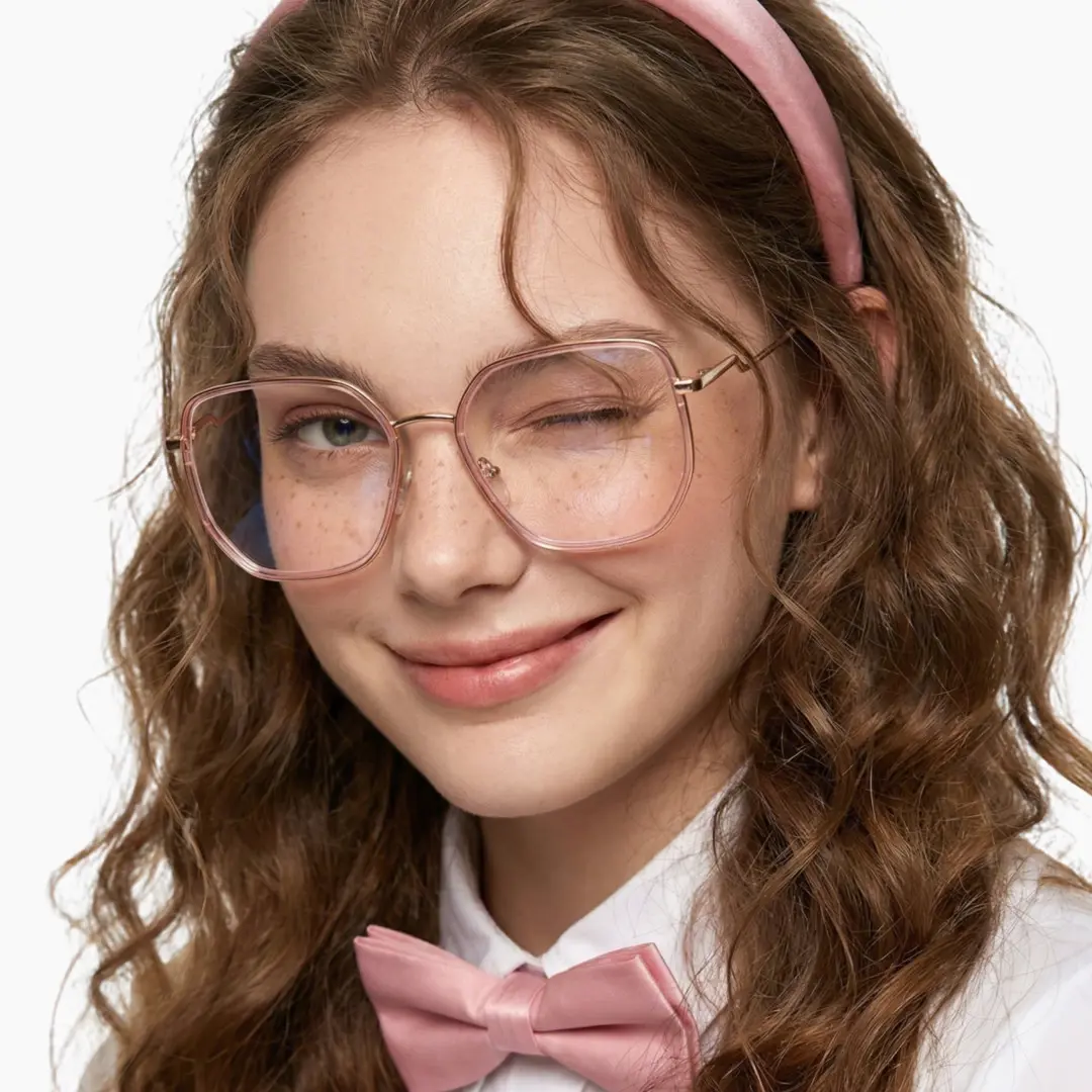 Straight-on view of female wearing pink square eyeglasses, winking, soft smile, SR0132209