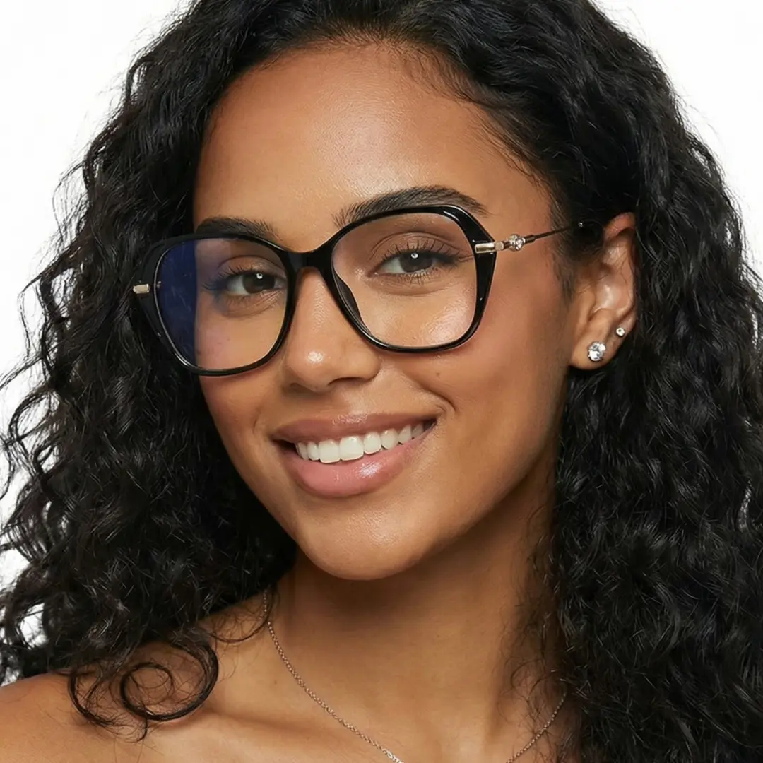 Slightly angled view of female wearing black square eyeglasses, natural smile, SR0132509