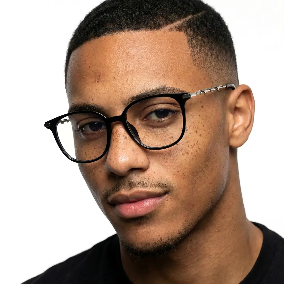 Front view of male wearing black square eyeglasses, relaxed expression, SR0162601