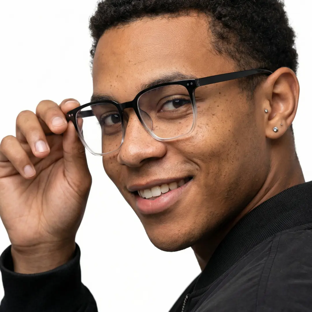 Profile view of male wearing blackclear square eyeglasses, adjusting glasses, smiling, SR0172409