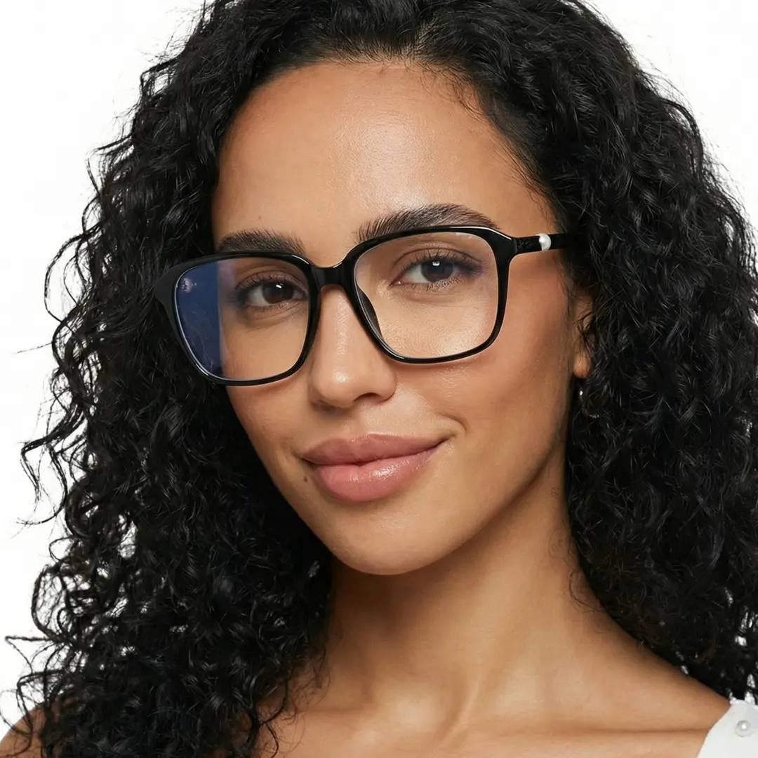 Close-up view of female wearing black square eyeglasses, neutral expression, SR0182509