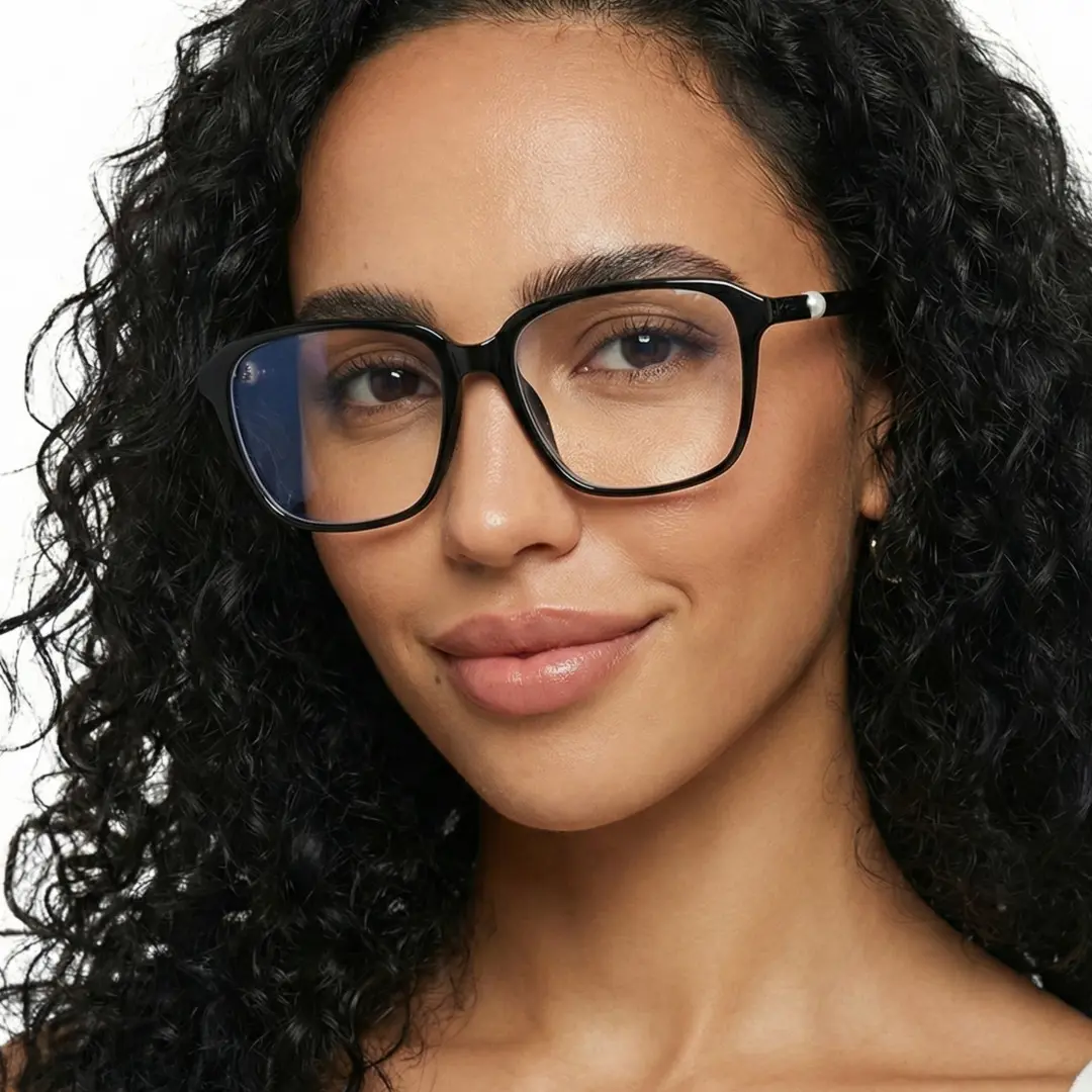 Front view of female wearing black square eyeglasses, natural smile, SR0182509