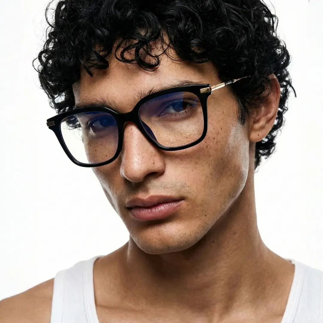 Three-quarter view of male wearing black square eyeglasses, calm expression, SR0192502