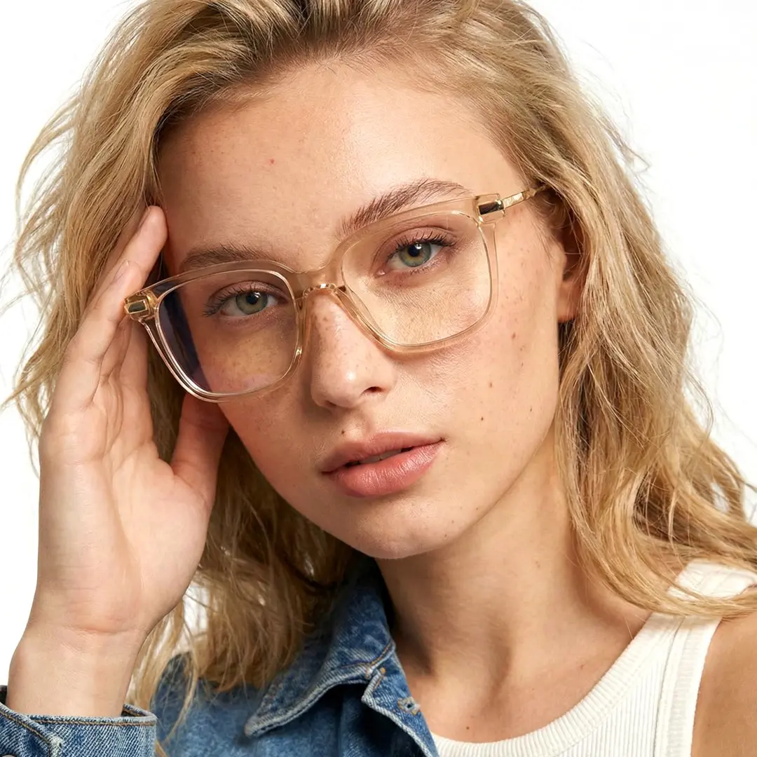 Front view of female wearing brown square eyeglasses, hand near face, neutral expression, SR0192502