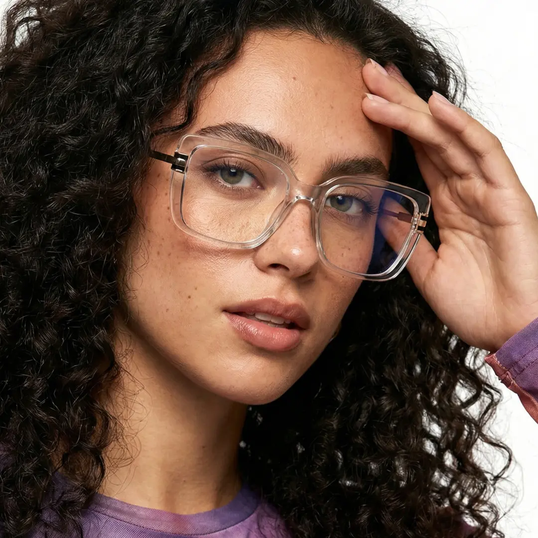 Face close-up view of female wearing clear square eyeglasses, hand resting on forehead, natural expression, SR0292508