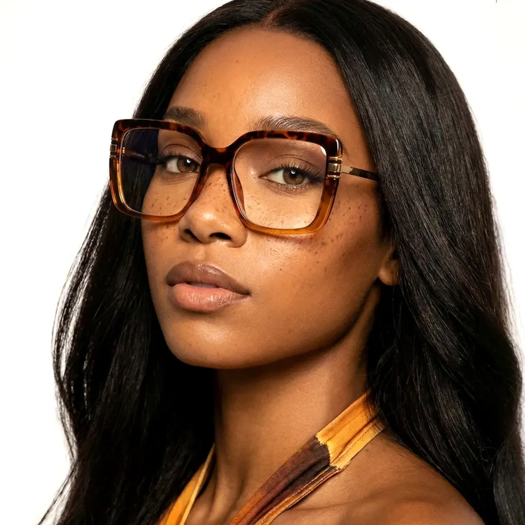 Slightly angled view of female wearing tortoise square eyeglasses, neutral expression, SR0292508