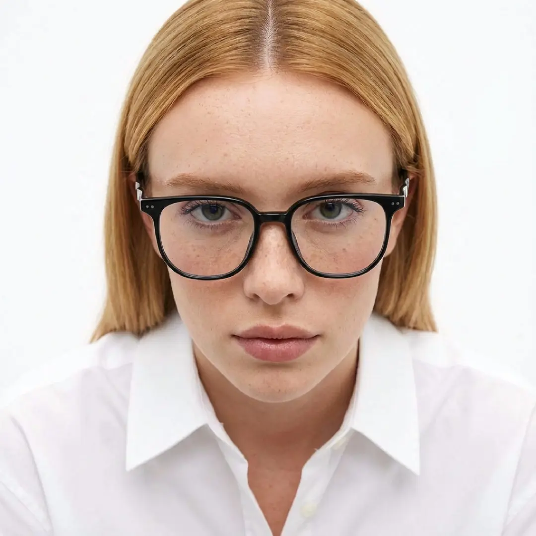 Front view of female wearing black square eyeglasses, confident expression, SR0342509