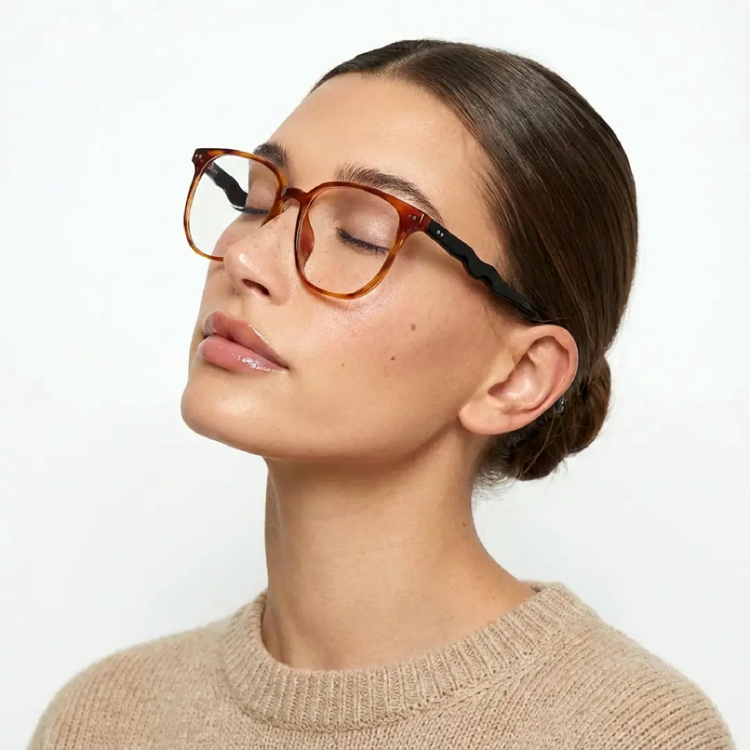 Three-quarter view of female wearing tortoise square eyeglasses, neutral expression, SR0342509