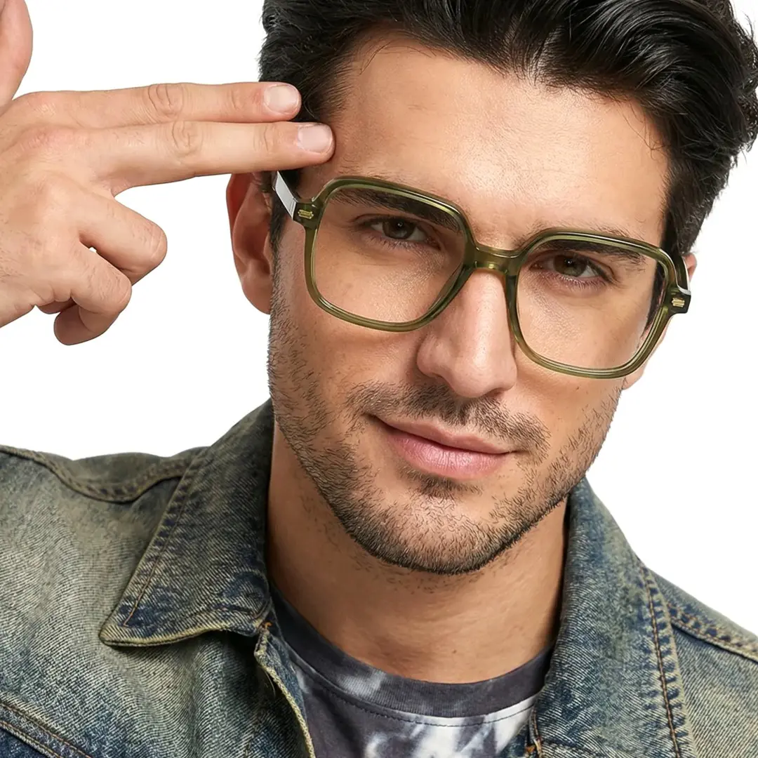 Slightly angled view of male wearing green square eyeglasses, natural expression, SR0362508