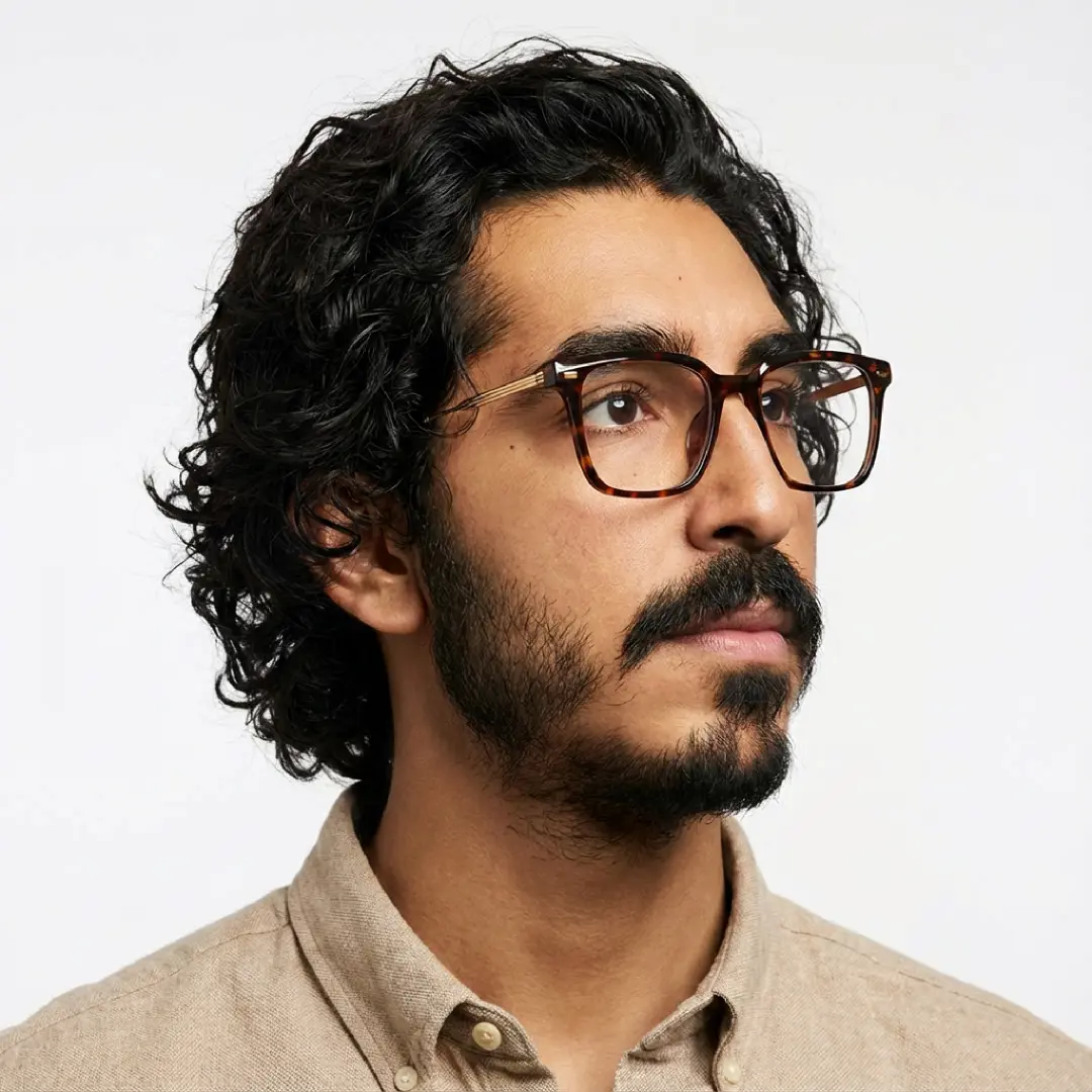 Three-quarter view of male wearing tortoise square eyeglasses, neutral expression, SR0362509