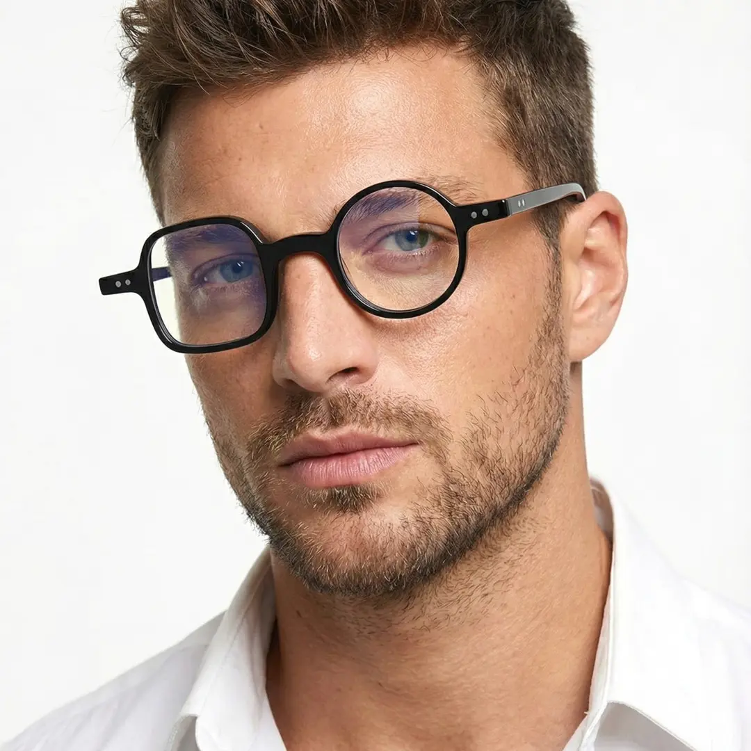 Tilted head view of male wearing black unique eyeglasses, neutral expression, UA0042001