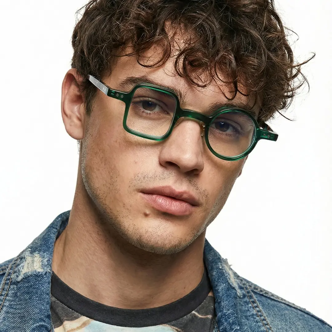 Slightly angled view of male wearing vintage green unique eyeglasses, neutral expression, UA0042001