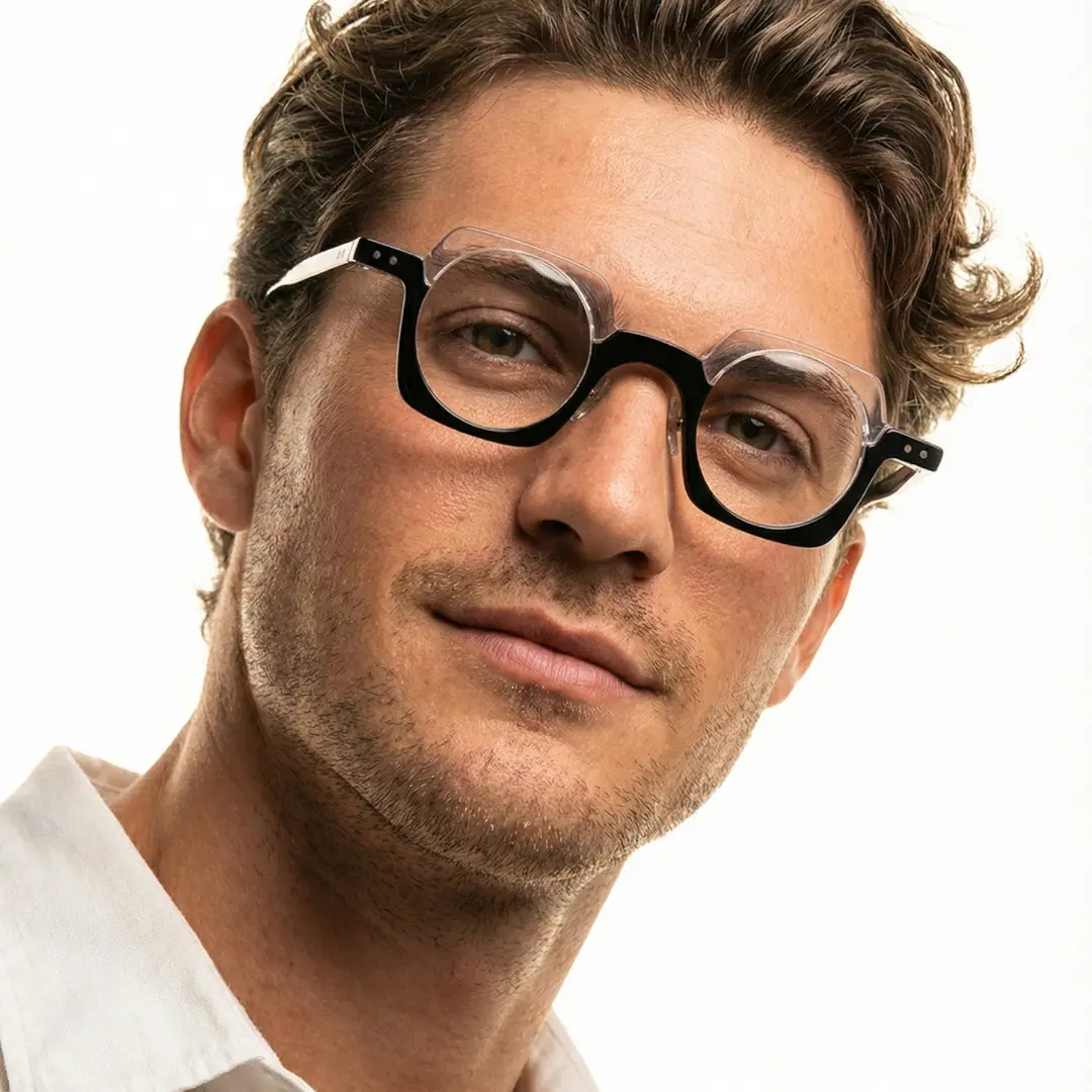 Front view of male wearing vintage black unique eyeglasses, natural smile, UA0052302