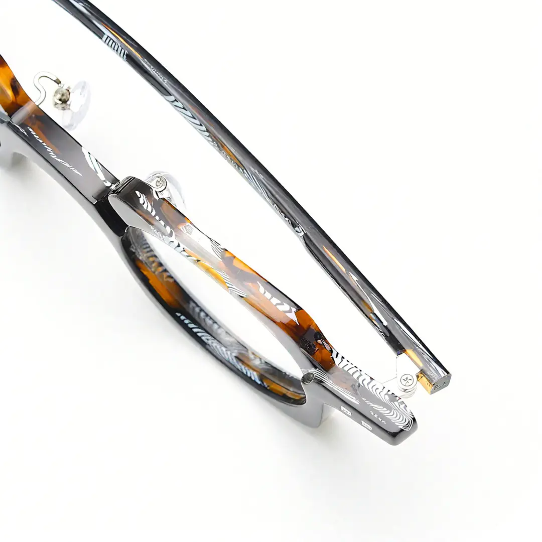 Frame detail view of Linye vintage unique acetate eyeglasses in blue tortoise. SPU: UA0052302
