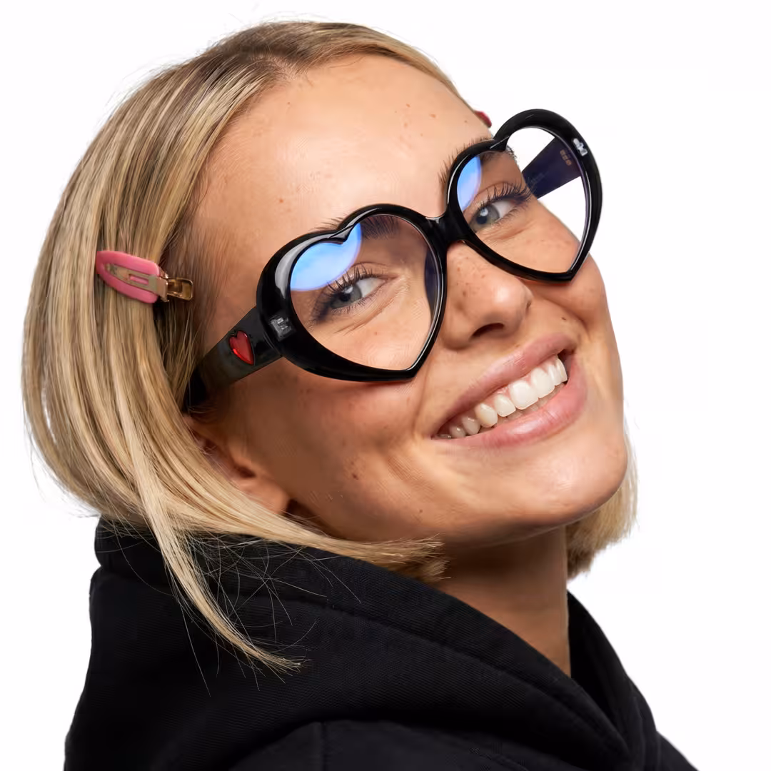 Close-up view of female wearing y2k black unique eyeglasses, natural smile, UP0232604