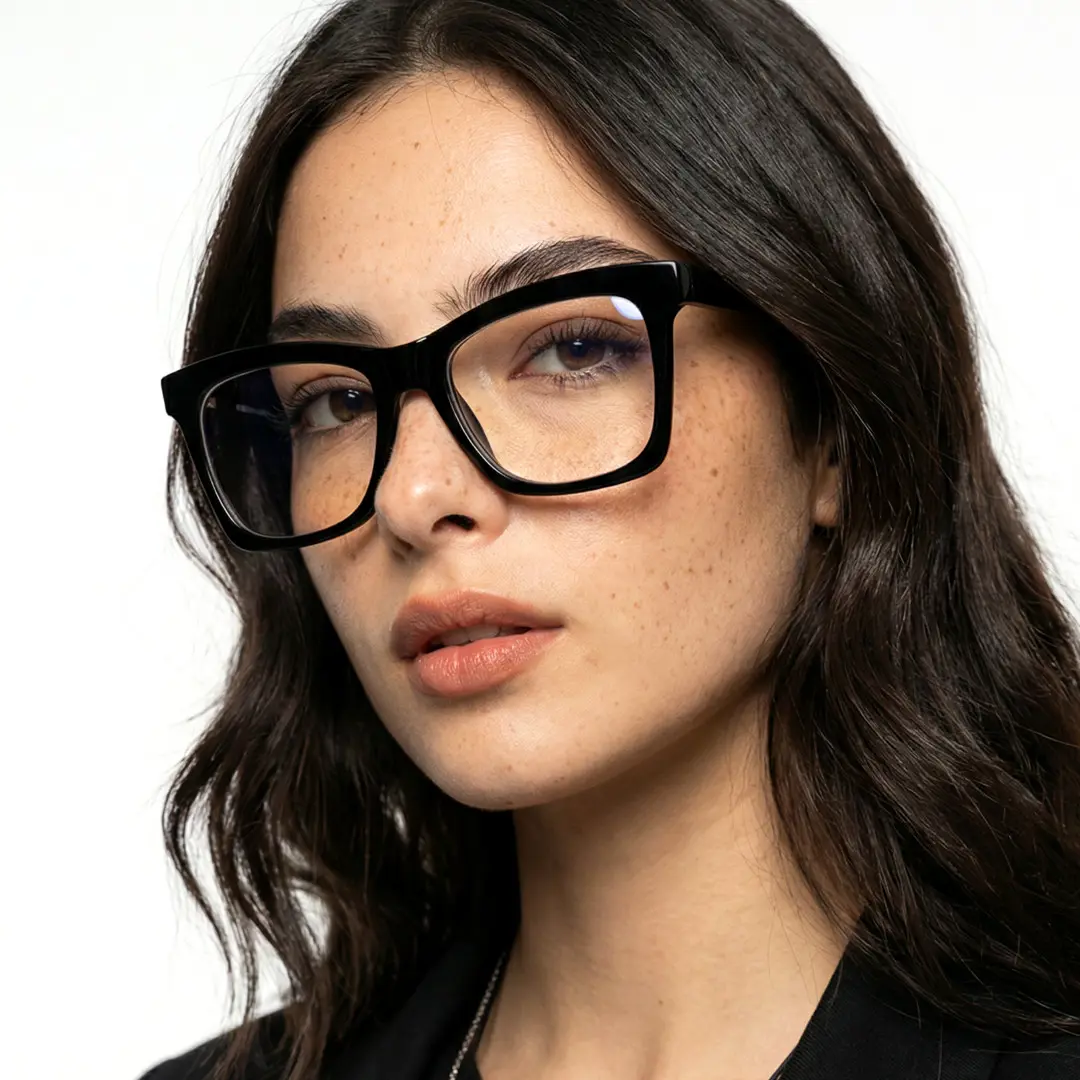 Three-quarter view of female wearing black butterfly eyeglasses, neutral expression, UR0152502