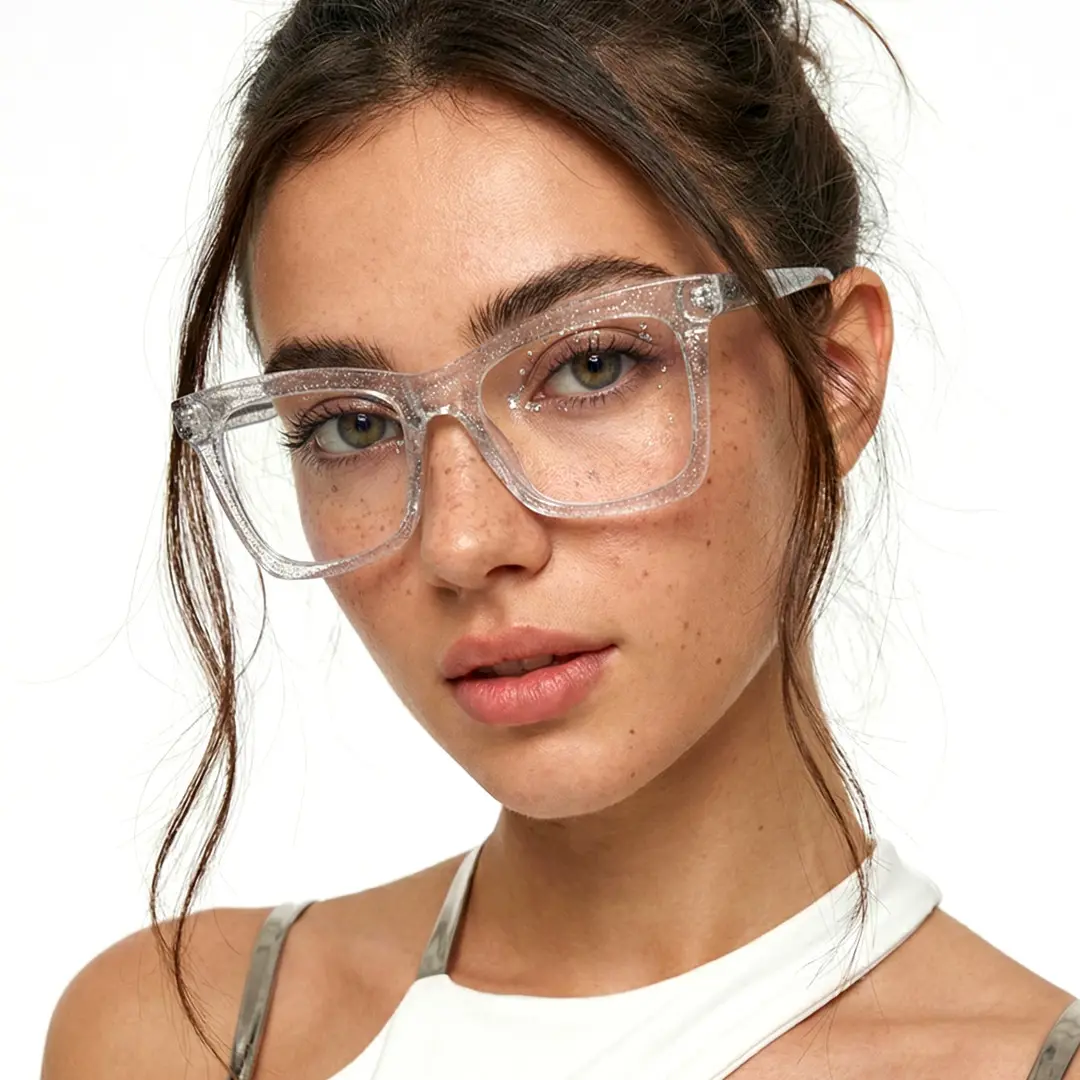 Tilted head view of female wearing clear butterfly eyeglasses, natural smile, UR0152502