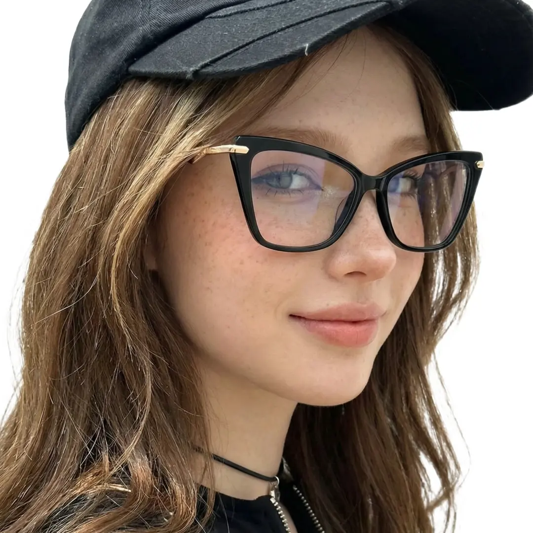 Over-the-shoulder view of female wearing black butterfly eyeglasses, natural expression, UR0172502