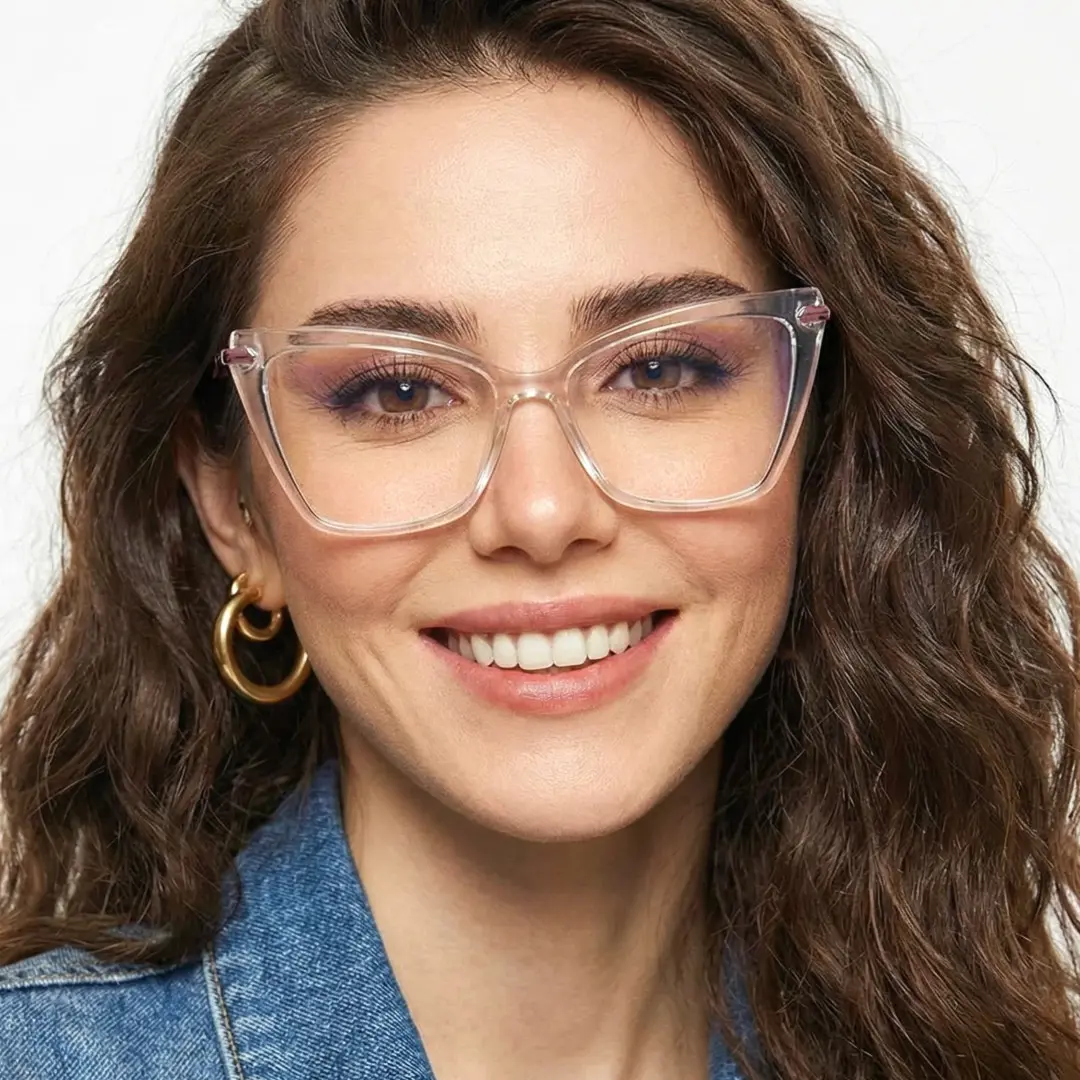 Straight-on view of female wearing clear butterfly eyeglasses, smiling, UR0172502