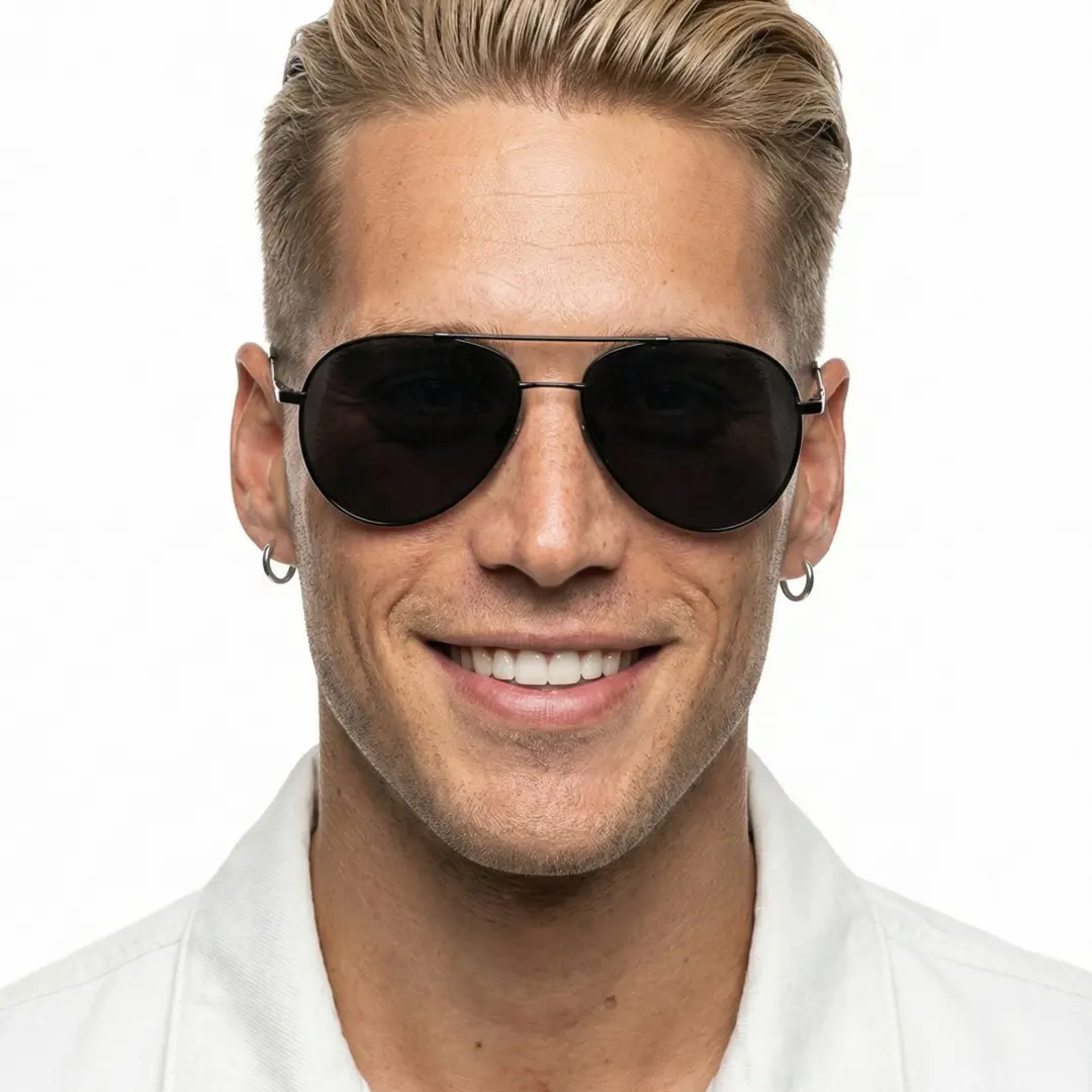 Close-up view of male wearing black aviator sunglasses, soft smile, AM0042603