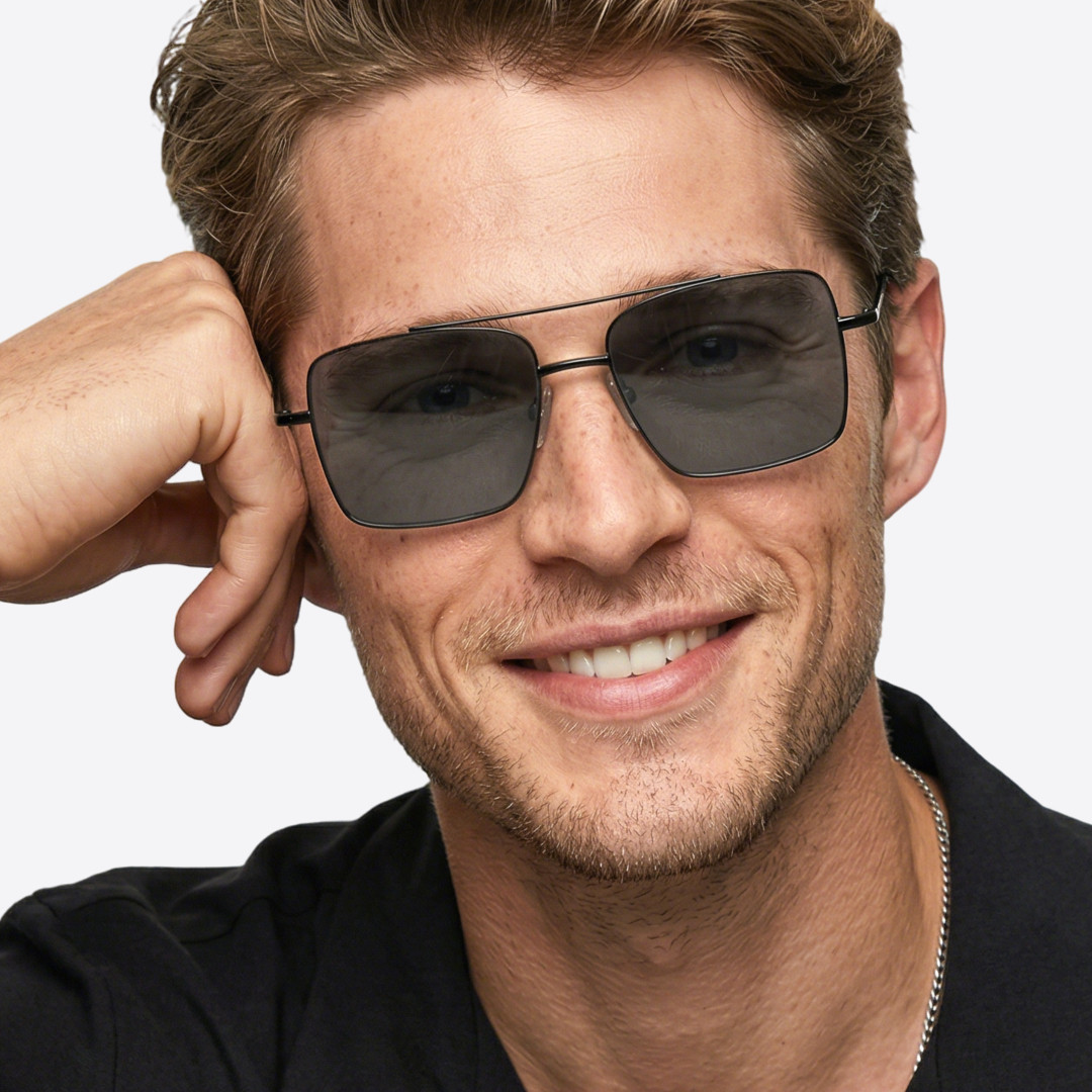 Front view of male wearing grey aviator sunglasses, friendly smile, AM0072505