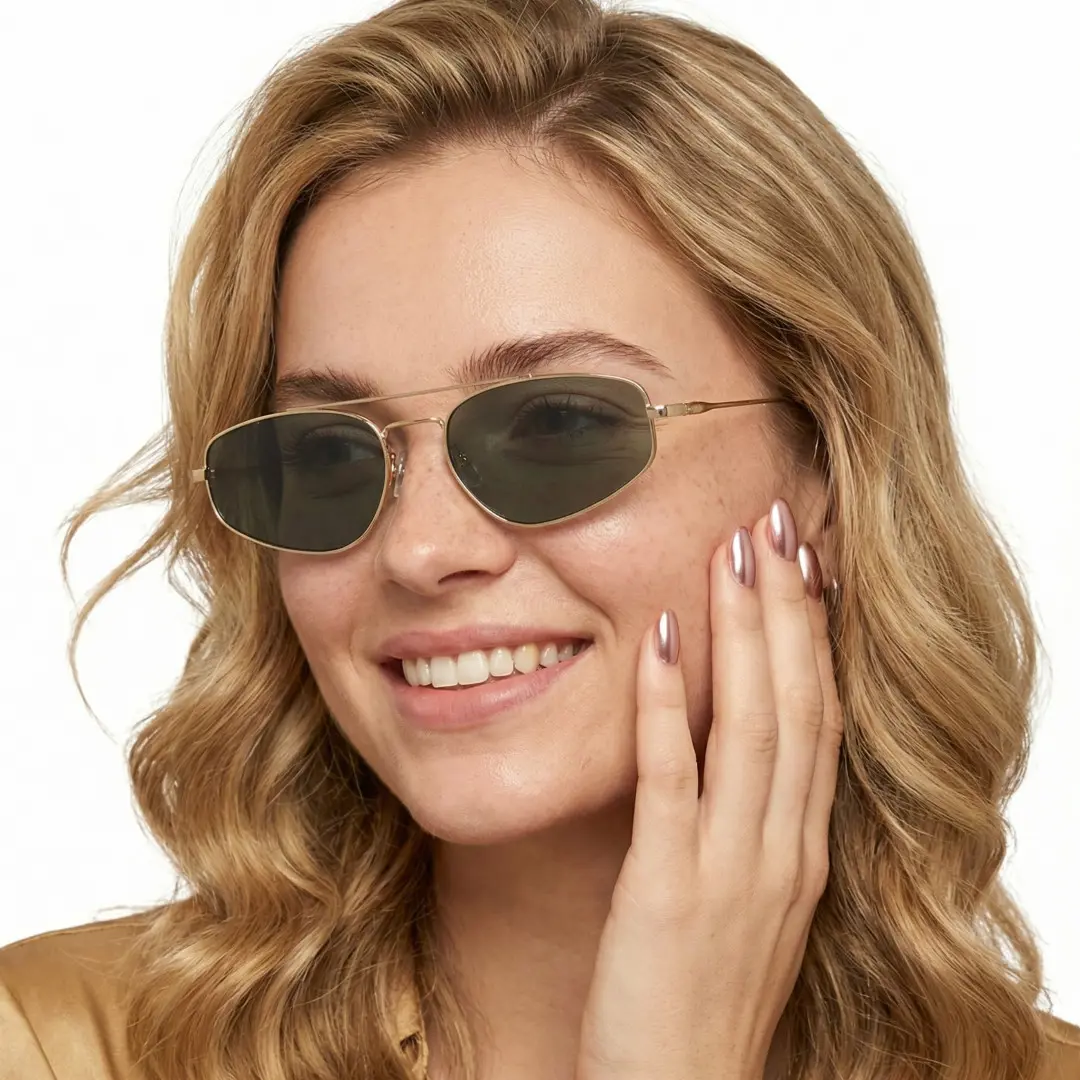 Profile view of female wearing gold aviator sunglasses, hand near face, friendly smile, AM0082603