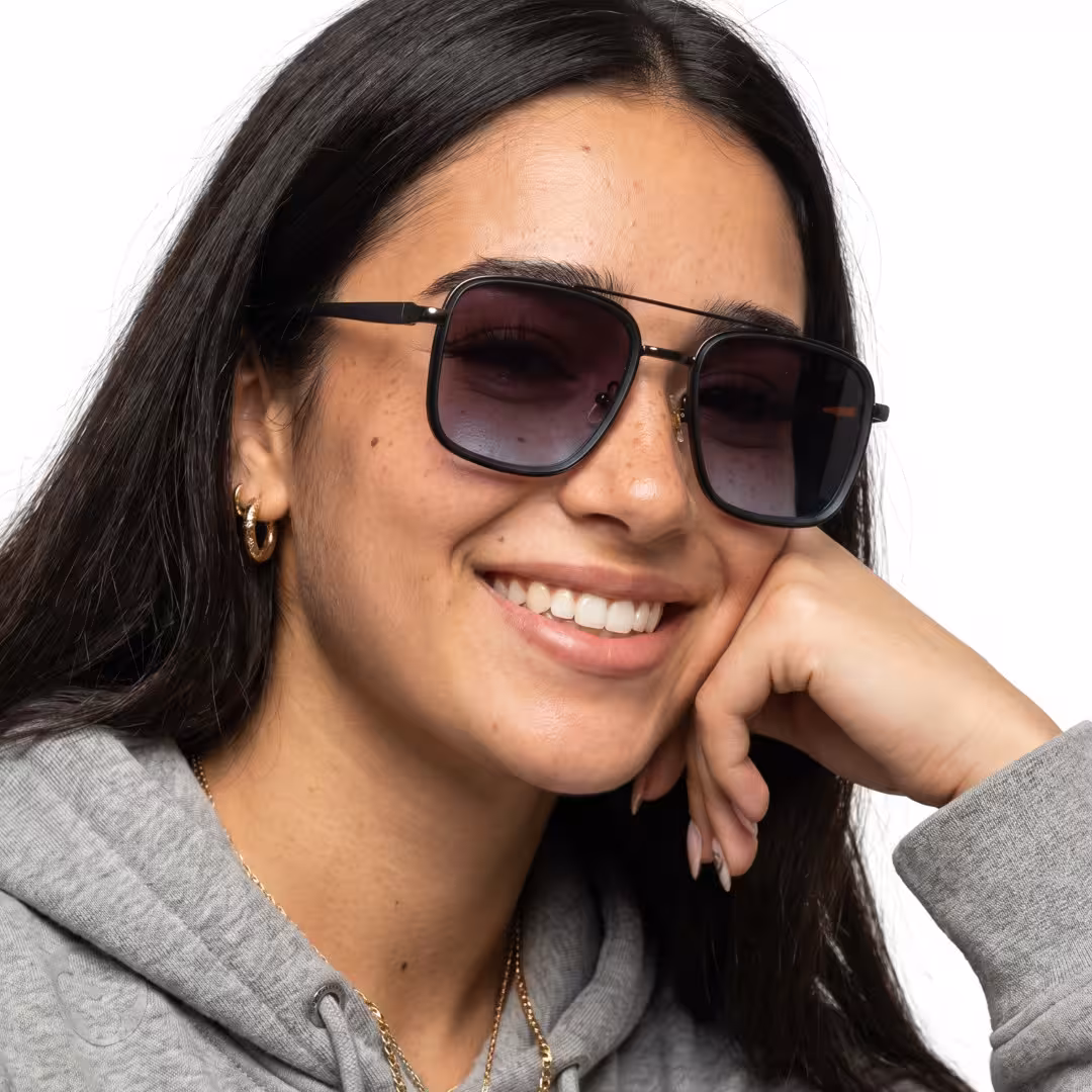 Female wearing vintage gray aviator metal sunglasses, smiling while hand near face. SPU: AM0242603