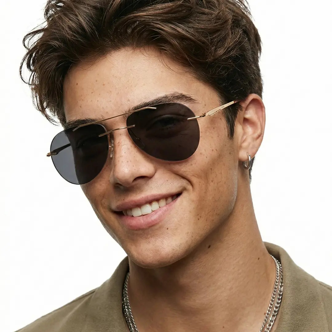 Three-quarter view of male wearing gold aviator sunglasses, smiling, AM0492506S