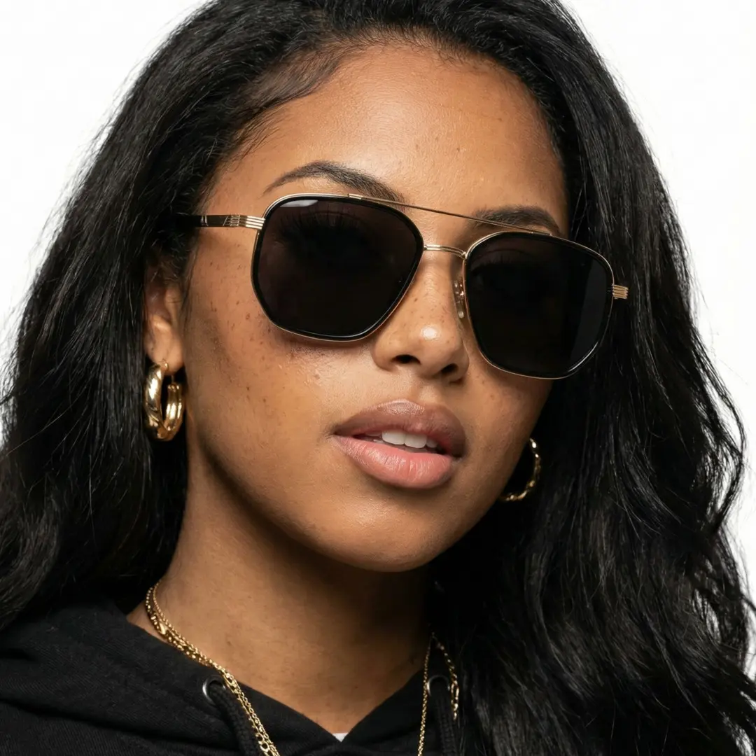 Front view of female wearing gold aviator sunglasses, neutral expression, AM0622505