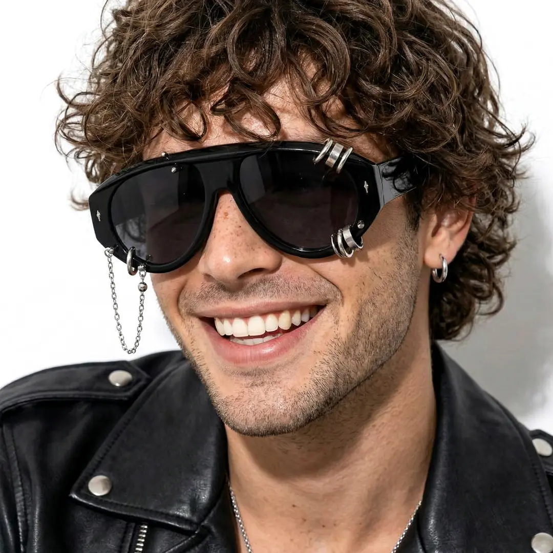 Three-quarter view of male wearing fashion silver aviator sunglasses, smiling, AP0082604