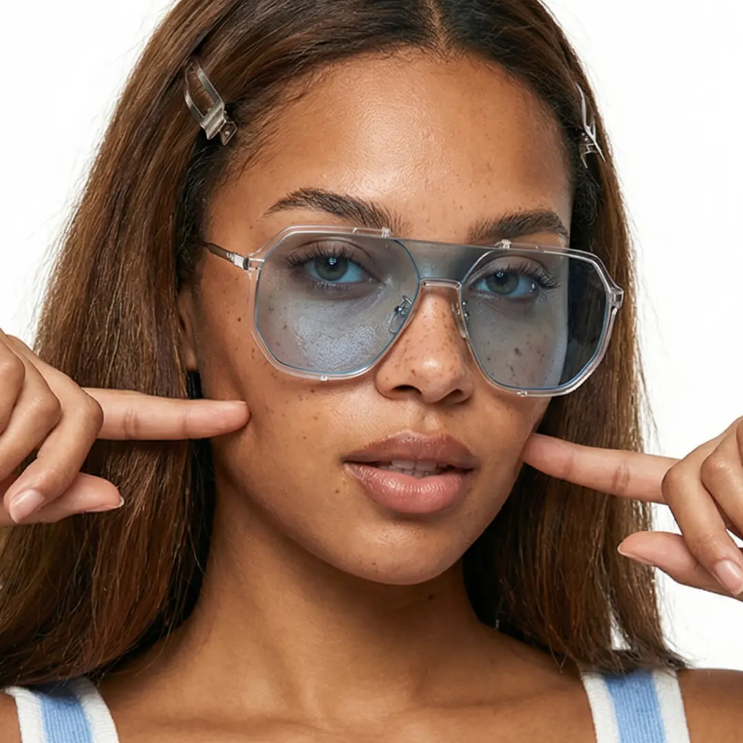 Slightly angled view of female wearing fashion blue aviator sunglasses, neutral expression, AR0042410