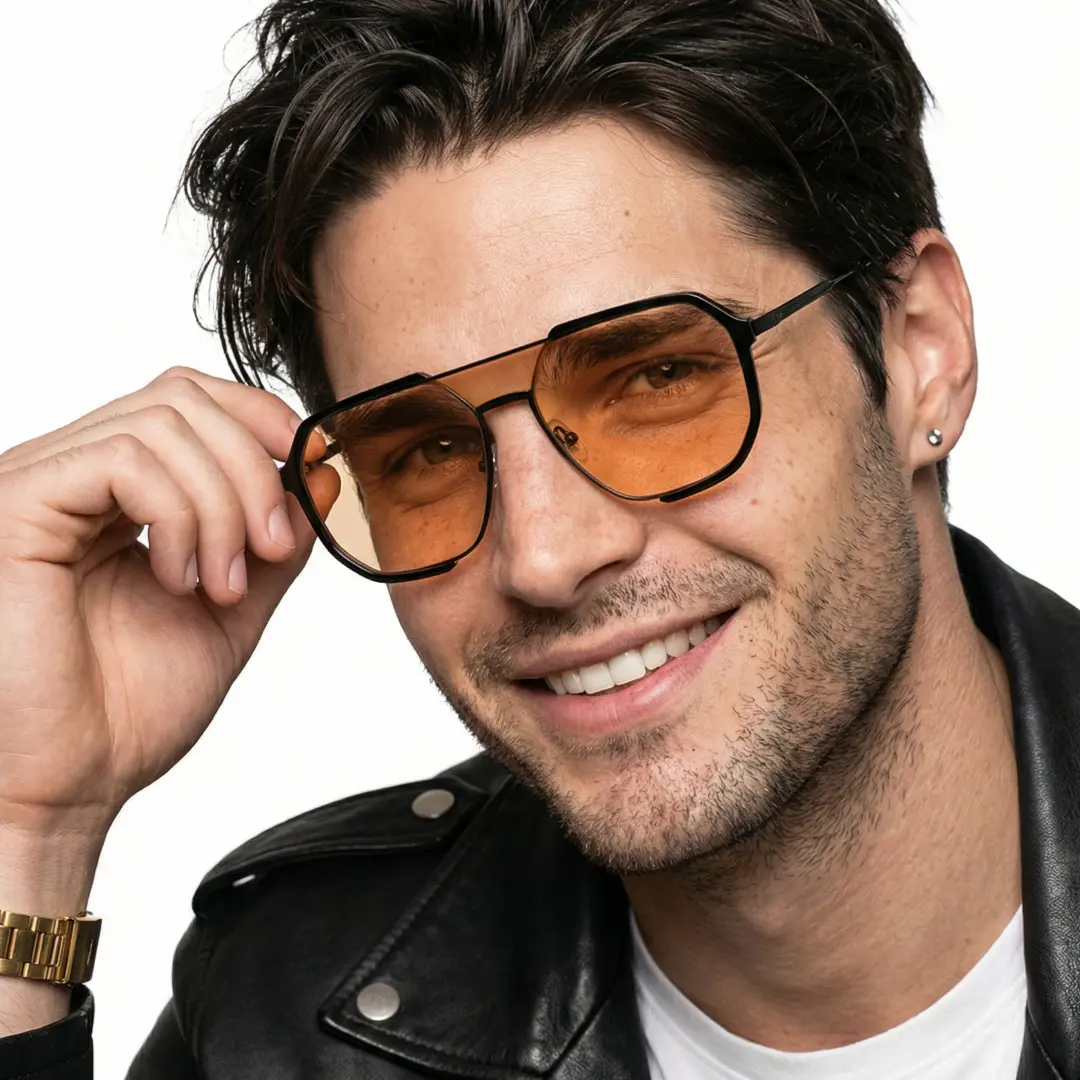 Three-quarter view of fashion male wearing orange aviator sunglasses, holding glasses, smiling, AR0042410