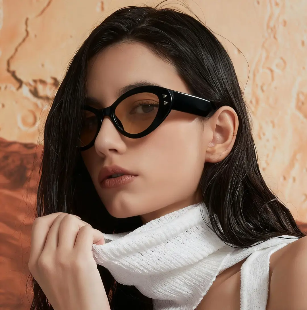 Three-quarter view of female wearing black cat eye sunglasses, calm expression, CP0012212