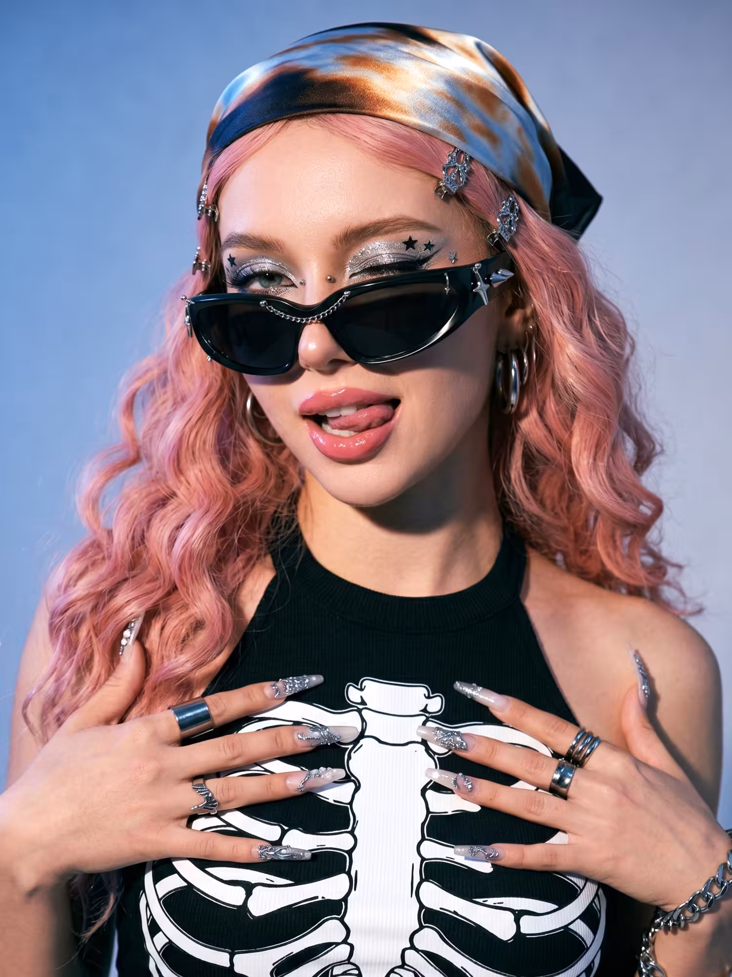 Female model wearing edgy handcrafted black cat eye pc sunglasses in studio setting. SPU: CP0032511