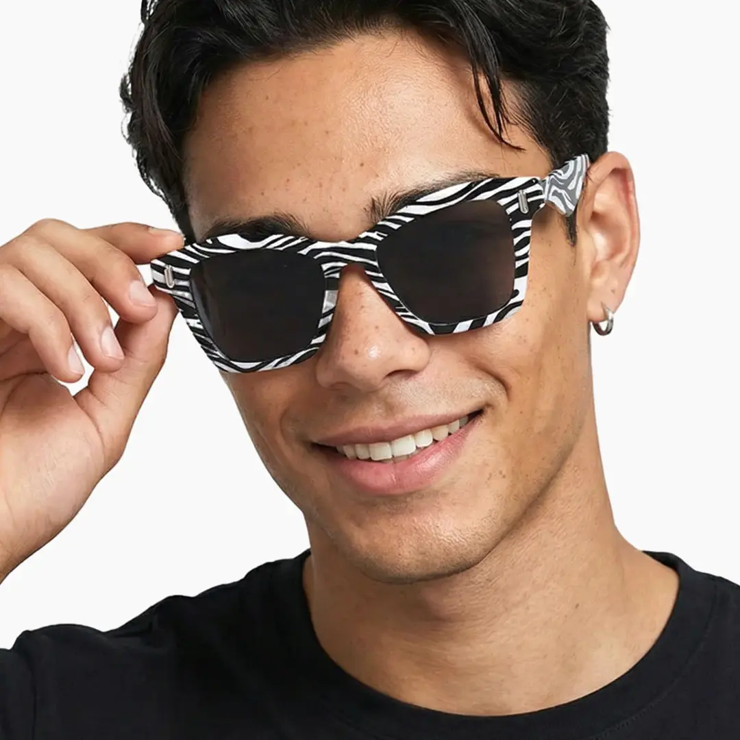 Front view of male wearing black cat eye sunglasses, smiling, CP0122506