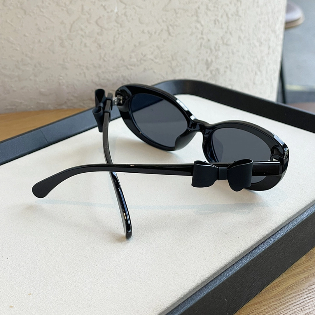 Scene view of Tula cat eye pc sunglasses CP0332512 in black