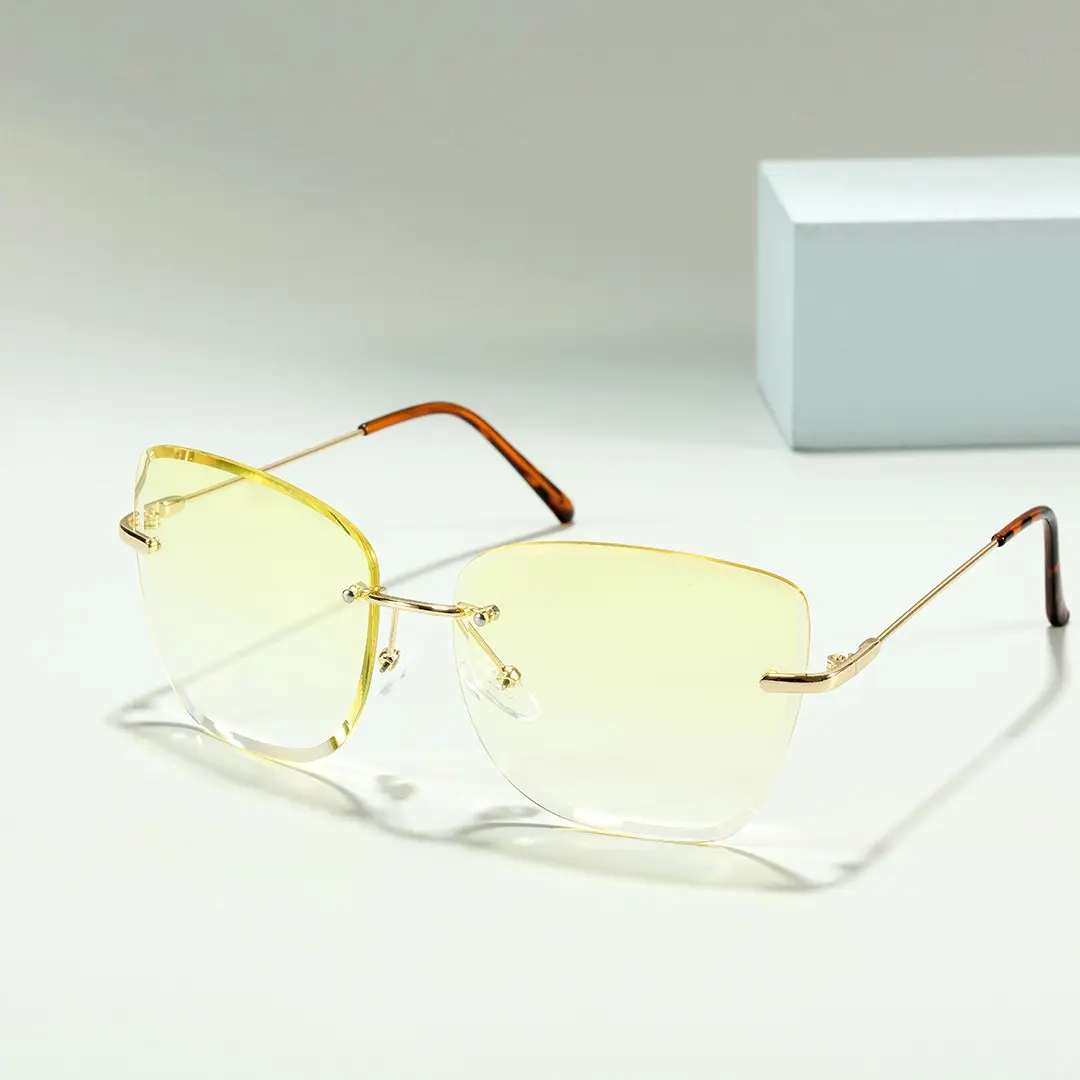 Scene view of Paula cat eye metal sunglasses CX0102505 in yellow