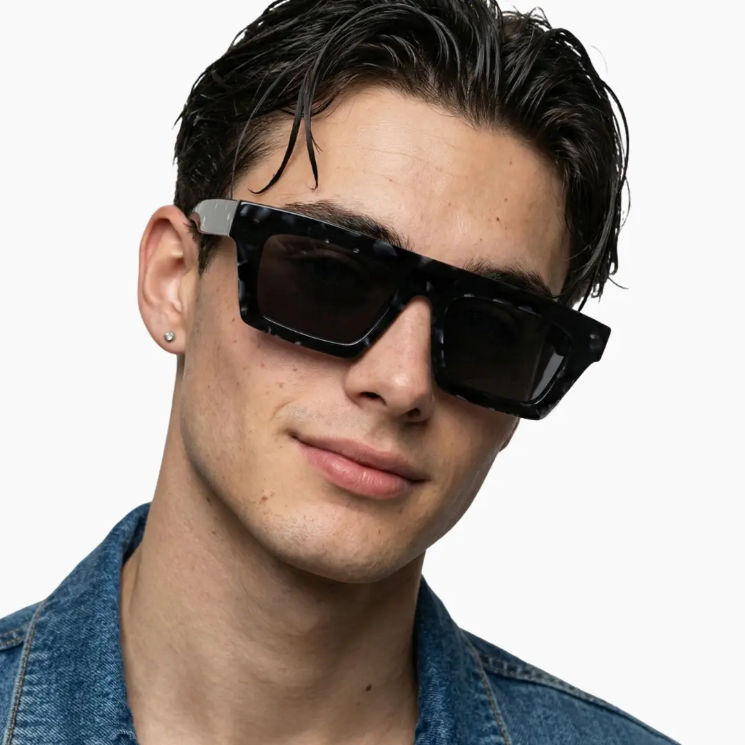 Front view of male wearing black rectangle sunglasses, tilting head, natural smile, EA0442508S