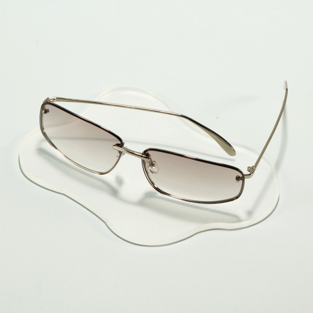 Scene view of Axiom y2k rectangle metal sunglasses in silver. SPU: EM0082606