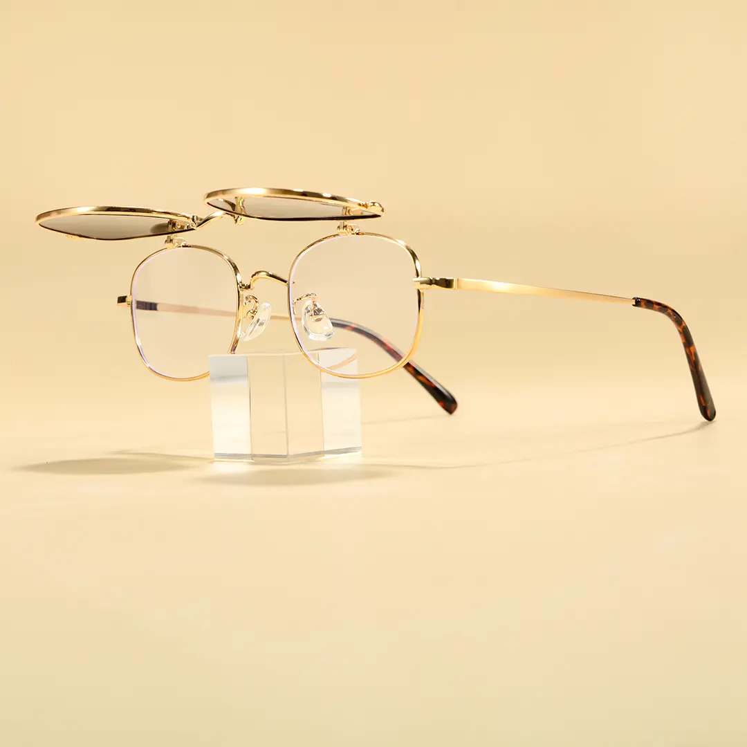 Scene view of Hybe rectangle metal flip-up eyeglasses in gold. SPU: EM0122603