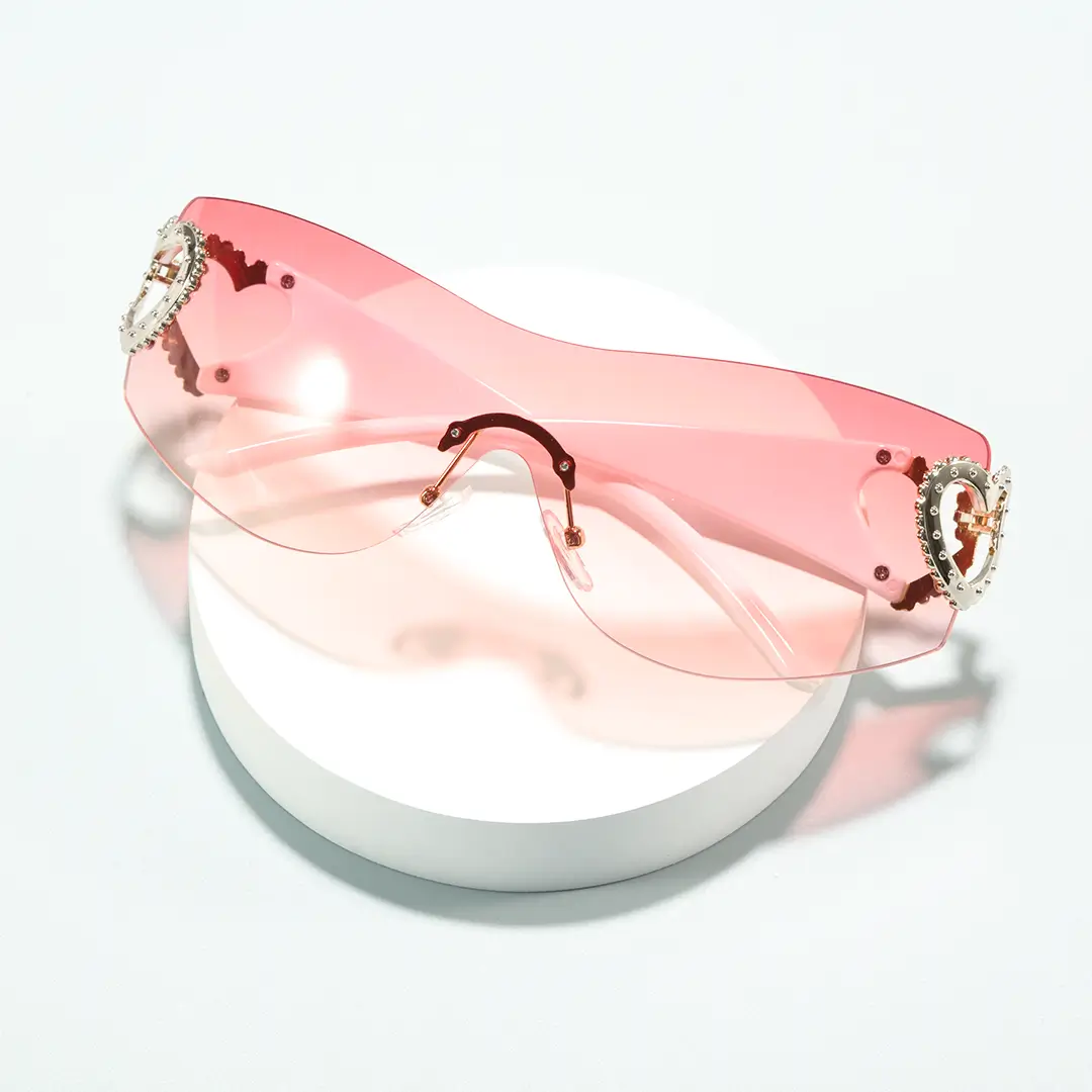 Scene close-up view of Marnie y2k rectangle pc sunglasses in pink. SPU: EP0022604