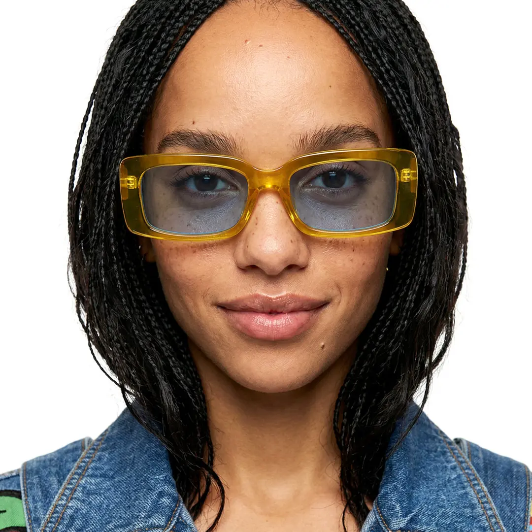 Straight-on view of female wearing fashion yellow rectangle sunglasses, neutral expression, EP0042212